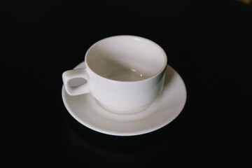 white porcelain cup and saucer for tea or coffee
