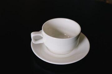 white porcelain cup and saucer for tea or coffee
