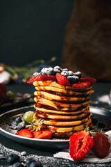 Pancake. Tasty pancakes with fruits, strawberries, berries, sugar. Pancakes with chocolate. Dessert. Breakfast pancakes. 