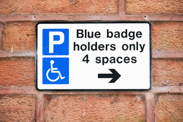 Disabled blue badge holder parking sign for driver 