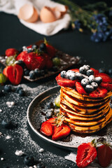 Pancake. Tasty pancakes with fruits, strawberries, berries, sugar. Pancakes with chocolate....