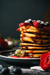 Pancake. Tasty pancakes with fruits, strawberries, berries, sugar. Pancakes with chocolate. Dessert. Breakfast pancakes.  - obrazy, fototapety, plakaty