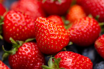 fresh juicy Strawberry fruits freshly picked full frame background