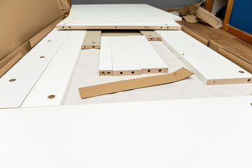 cardboard box, packaging with new furniture and fittings for assembly at home