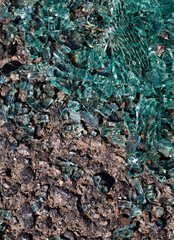 broken car glass on the new asphalt