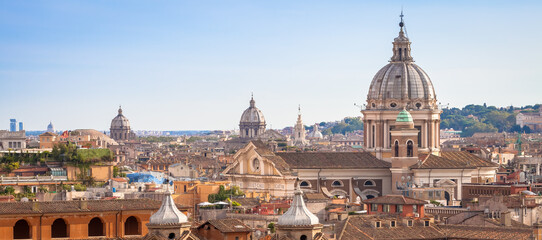 Fototapeta na wymiar Rome cityscape with blue sky and clouds, Italy