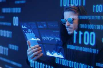 Man with futuristic tablet in hand. Guy using VR glasses. Augmented reality, future technology concept. Blue neon light. Futuristic holographic interface to display data.