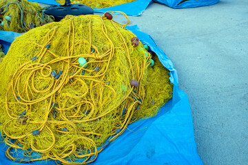Fishing nets drying under the sun. Fisherman equipment.