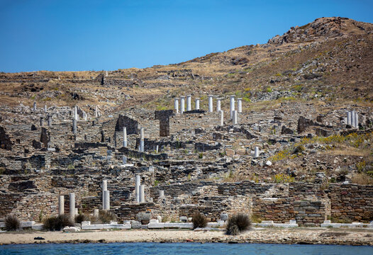 Delos ruins of ancient civilization at seaside Cycladic island Greece.