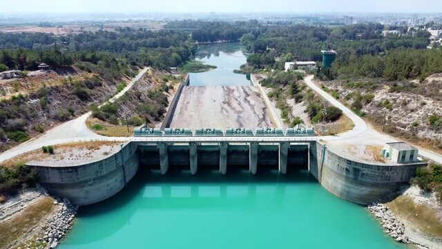 Aerial view of water reservoir and closed reservoir locks of a dam. Berdan dam, Tarsus, Mersin province, Turkey