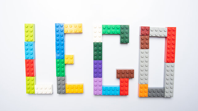 Araras, São Paulo, Brazil. July 4, 2021. Details of colorful lego pieces forming the LEGO name, white background, selective focus.