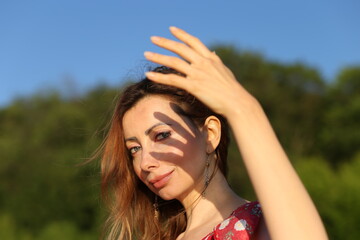 Portrait of a woman with shadows on her face