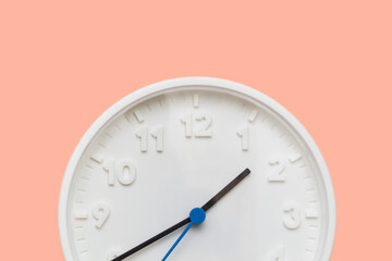 White clock on white wall background. quality photo
