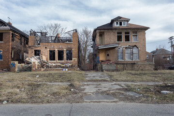 Abandoned homes left to decay in urban Detroit neighborhood - 443296066