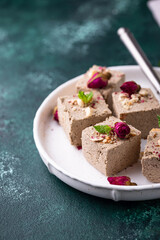 Halva with rose petal and nuts.