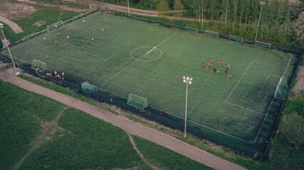 Fototapeta na wymiar Soccer field from above. Sports field with a football field