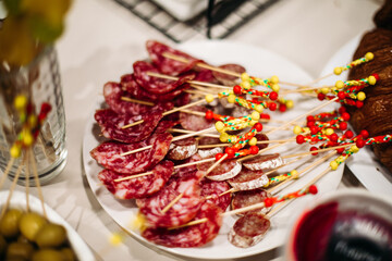 Sausage sticks on plate.