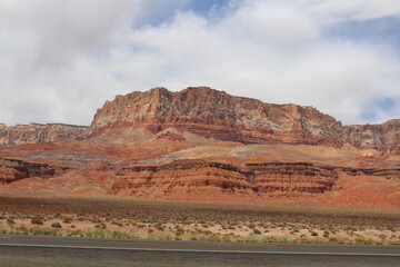 Towering and colorful vermillion cliffs located in northern Arizona reveal millions of years of geologic history