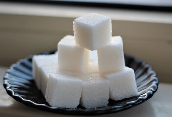 closeup of sugar cubes on the plate