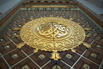The door of Masjid Nabawi. Arabic Calligraphy: Muhammad Rasulullah