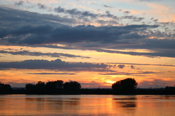 Fototapeta na wymiar Sunset on the Vistula River in Chełmno, Poland.