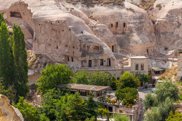 Fototapeta premium The homes and caves of Cavusin, Neveshir Province in Cappadocia, Turkey