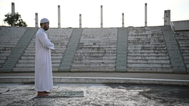 Asian white islam man prayer,Young Muslim praying,Ramadan festival concept