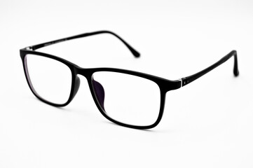 Modern black framed plastic reading glasses, glasses isolated on white background