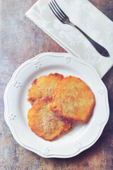 Potato pancakes on stone background. Top view. 