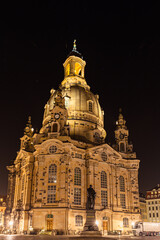 Fototapeta na wymiar Night view of the Frauenkirche church with statue of Martin Luther on Neumarkt square in the old town of Dresden, Saxony, Germany.
