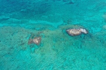 Aerial view of coral rocks off North Bimini, Bahamas on sunny summer afternoon.