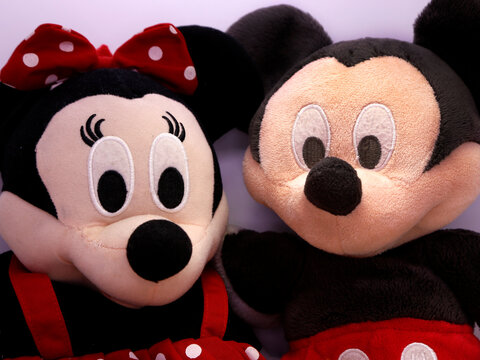 Mickey and Minnie Mouse plush doll. Toy. Cartoon characters from Walt Disney Pictures Studios. Minnie is Mickey Mouse's girlfriend. Soft toys for children.