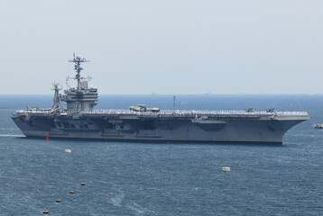US Navy aircraft carrier George Washington arrives at Yokosuka Port in Japan.