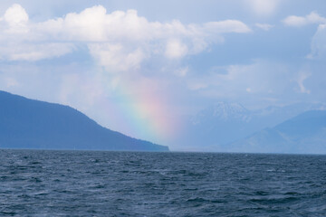 Fototapeta premium Rainbow, Landscape of the Inside Pasage in South East Alaska