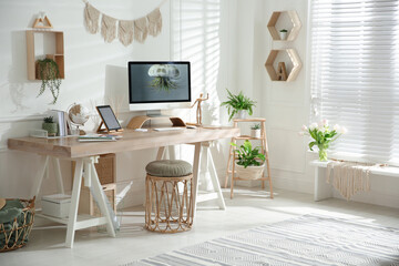 Stylish home office interior with comfortable workplace