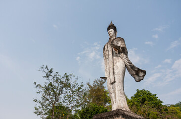 Buddhist Stone Statues with Blue Sky and Copy Space