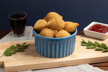 Traditional Brazilian snack coxinha of chicken.