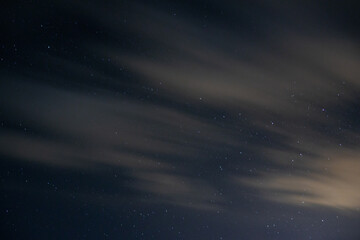 Fototapeta na wymiar Sky at night with mountains and stars