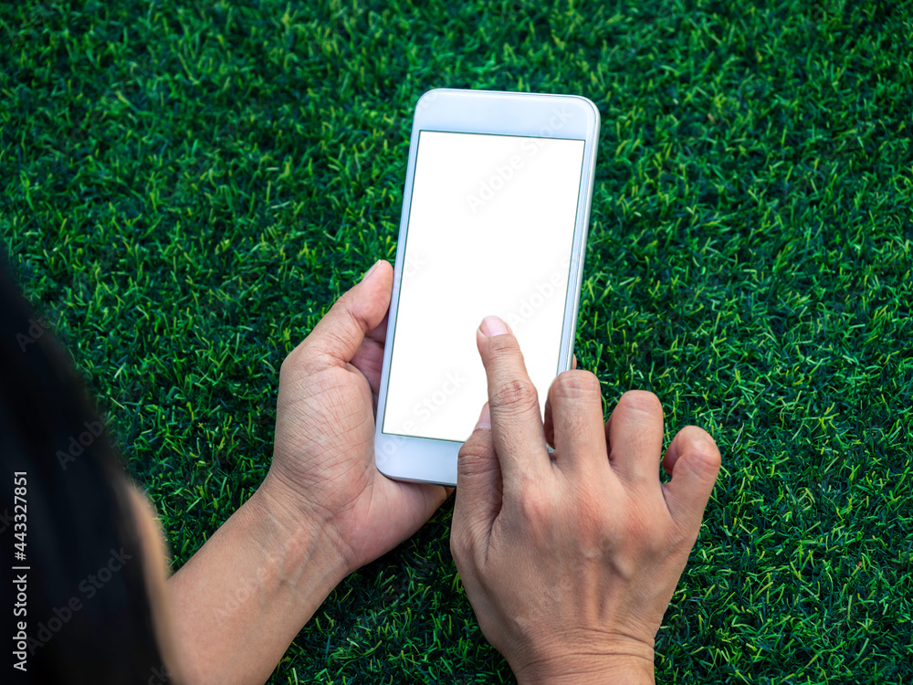 Poster mockup image of phone. close-up white blank screen with finger touching on mobile phone in hand on g