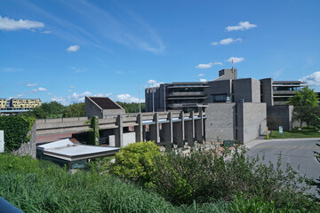 Trent University is a small city liberal arts university with modern architecture in a scenic riverside location.