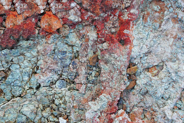 Multi-colored texture of natural stone, red, gray 