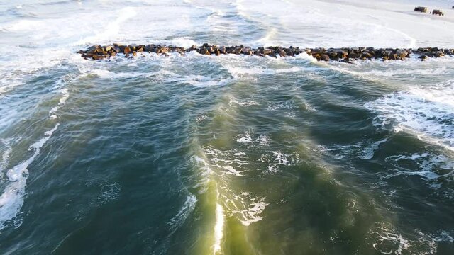 Drone revealing shot of New Smyrna Beach, Shark Capital of the World. 