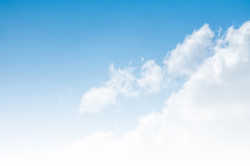 Beautiful blank background over the clouds with cleared blue sky, soft looks image, close up to the clouds, grading white color from below.