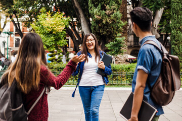 young mexican woman in group of Latin students in university in Latin America