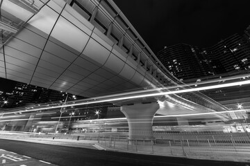 Light trail of traffic in downtown district of Hong Kong city at night