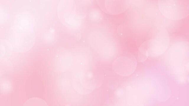 星とふわふわ浮かぶ玉.ピンク色の背景動画