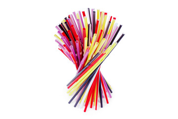 Colorful plastic cocktail straws, many plastic drinking pipes, plastic tubes for beverages on white background isolated close up, bar tableware, plastic kitchen utensil, fun party accessories