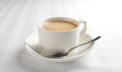 a cup of hot cafe coffee with fresh milk on white background halal beverage menu