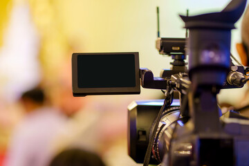 video camera in business conference room recording participants and speaker, seminar meeting, event and seminar concept - 443345635