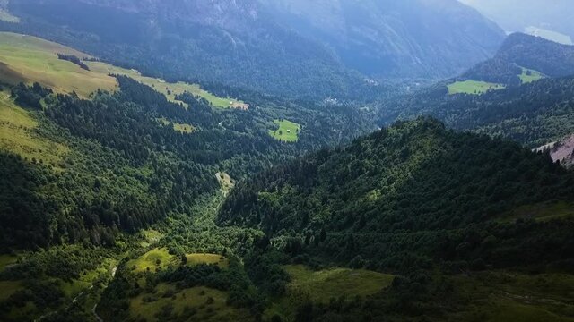 Panoramic View Of Mountains Ranges With Lush Forest Landscape On Misty Morning. - Aerial Wide Shot